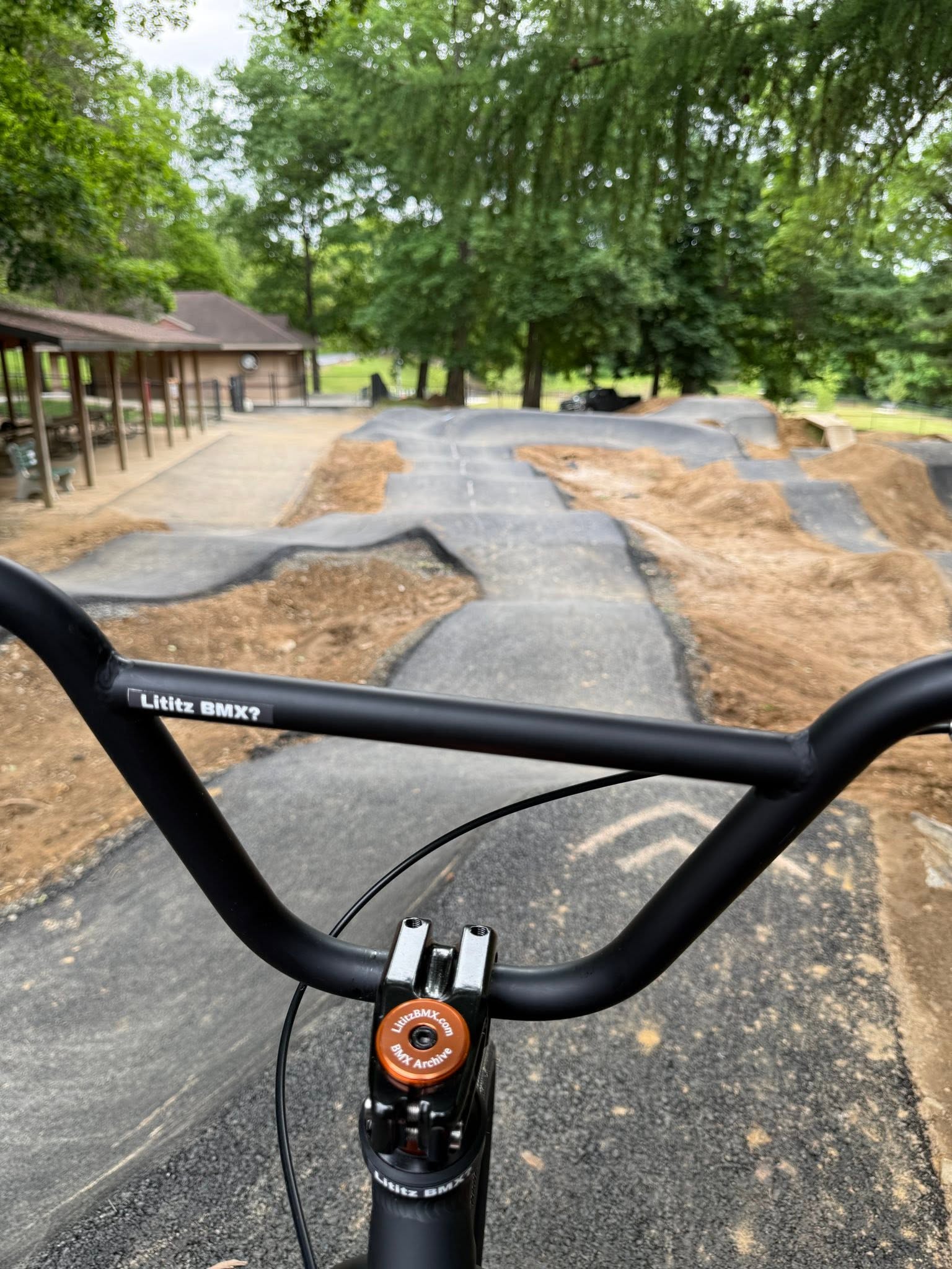 Kyle with the completed Huffy HX Pro Cruiser on the Coleman Bike Park pump track.
