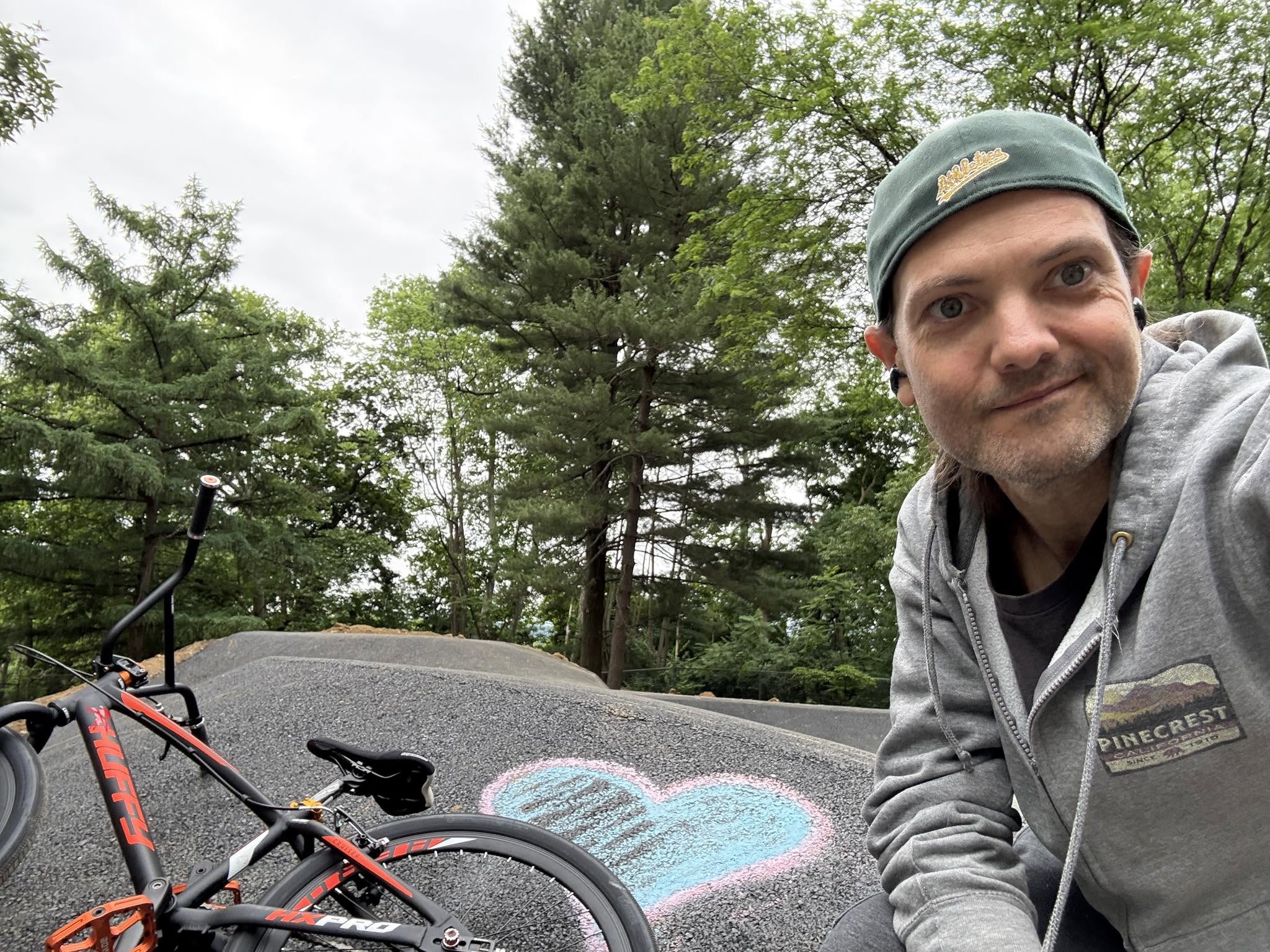 Rider’s-eye view over the Huffy handlebars and Lititz BMX Archive stem cap at Coleman Bike Park.
