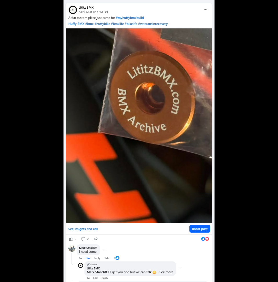 The orange Lititz BMX Archive stem cap photographed before installation.