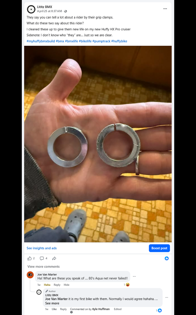 Two metal outer grip clamps held after cleaning, with wear and imperfections still visible.
