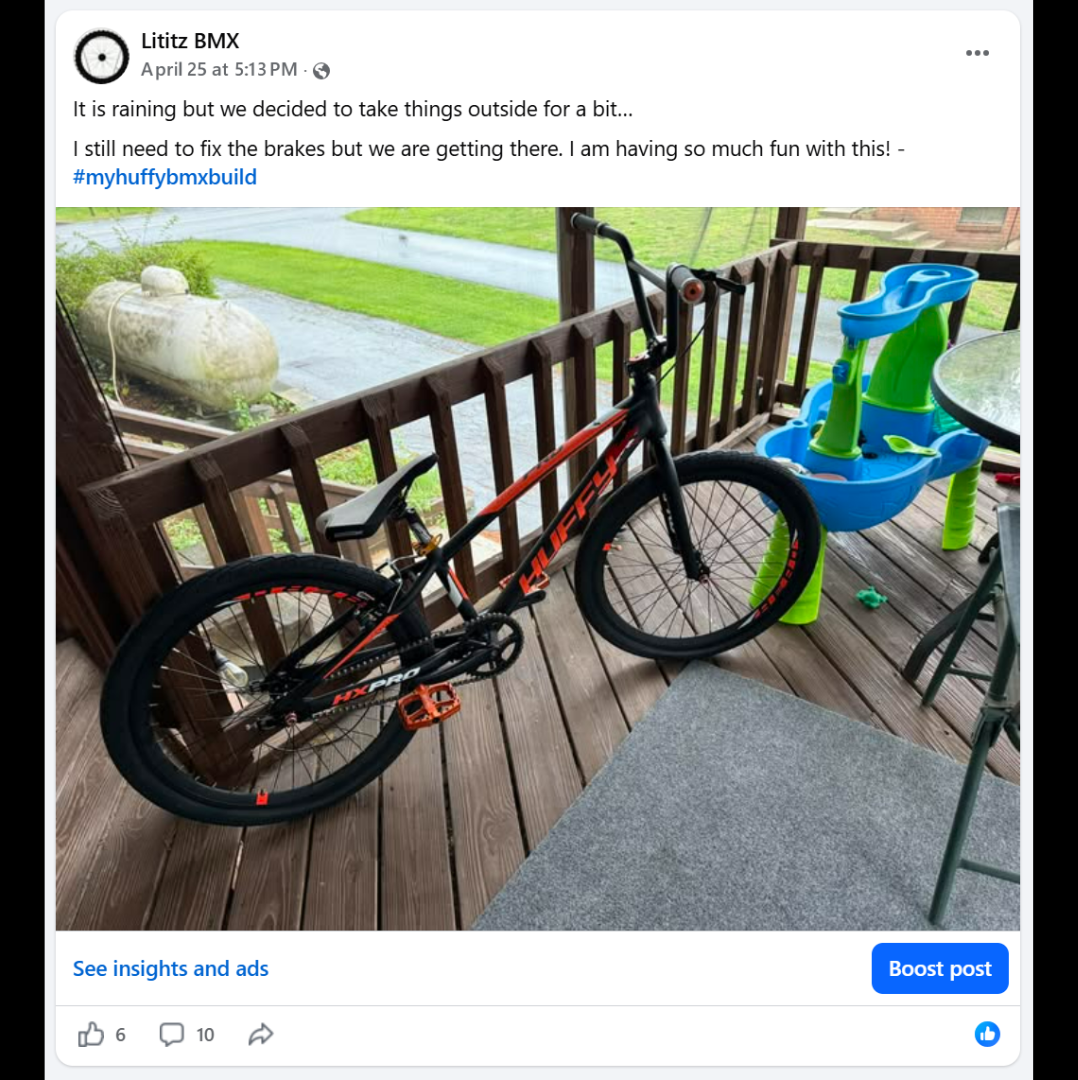 The Huffy moved from the stand to a covered porch during rain.