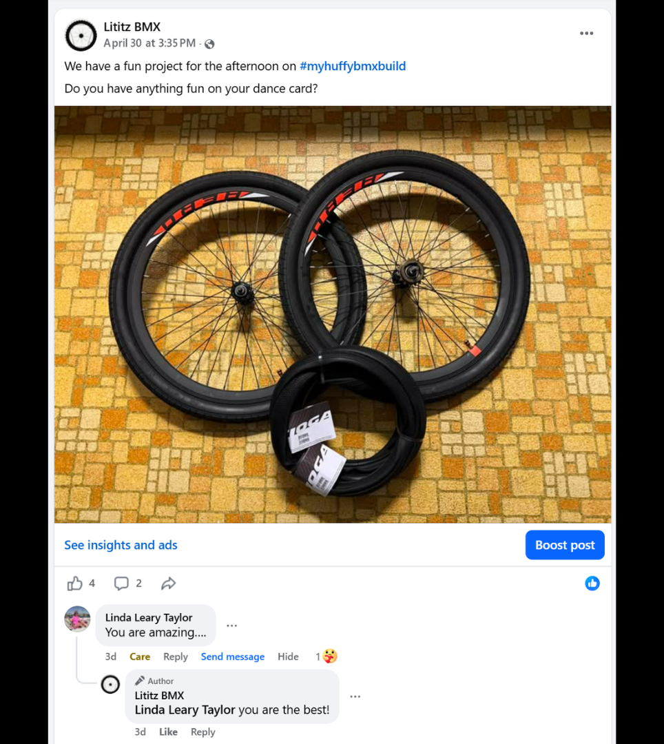 Replacement wheels and tires laid out for a later stage of the build.